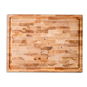 Walnut and maple cutting boards side by side for comparison