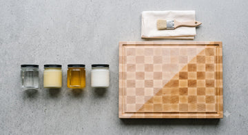 Food-safe cutting board finishes beside a half-conditioned end-grain maple board