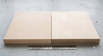 Solid birch cutting board beside a birch plywood board showing its plies