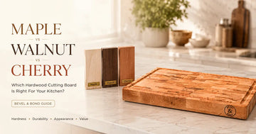 Three hardwood cutting boards side by side: pale hard maple, dark walnut and warm reddish cherry