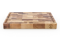 Bevel & Bond end-grain maple cutting board with its premium black gift box