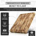 Board features labelled: food-safe hard maple, deep juice groove, ergonomic side handles and non-slip rubber feet